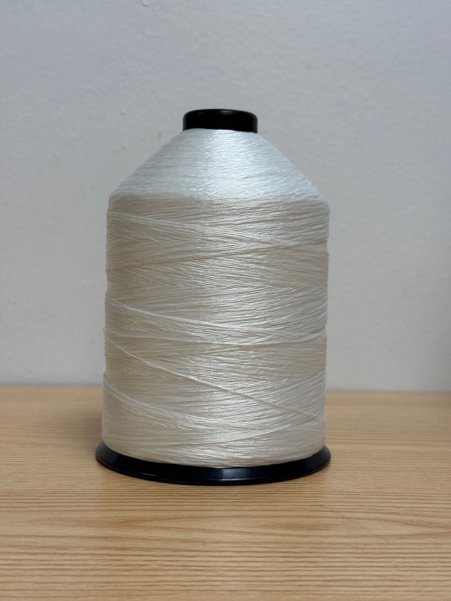 T-90 NYLON  WHITE POLY 0001 THERMABOND UVEX (upholstery) 16 OZ