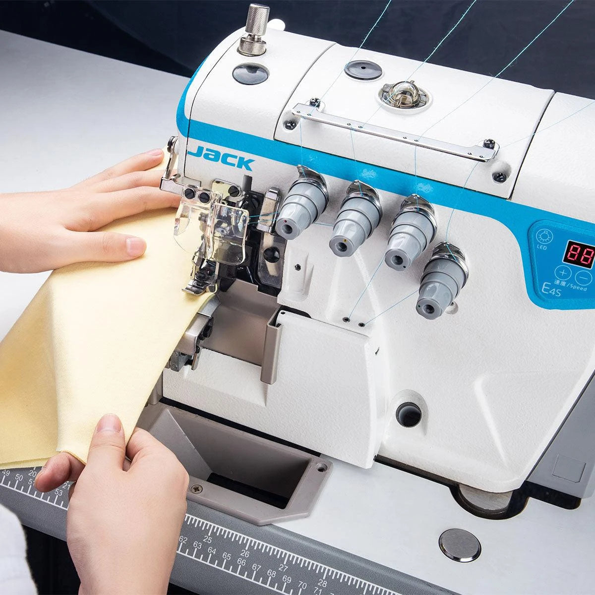 JACK® E4S-5-03/333 5-Thread Direct Drive Fully Submerged Overlock Industrial Sewing Machine – Complete with Table & Stand